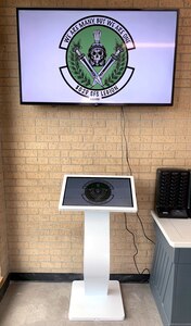 An example of the new kiosks at the Joint Base San Antonio-Lackland Luke East Visitor Control Center. The intent of the kiosk and new pager system is to minimize the number of customers in the VCCs and to allow customers to wait outside in the comfort of their vehicles until they are called to be serviced by receiving a message on their cell phone or being notified on the pager device.