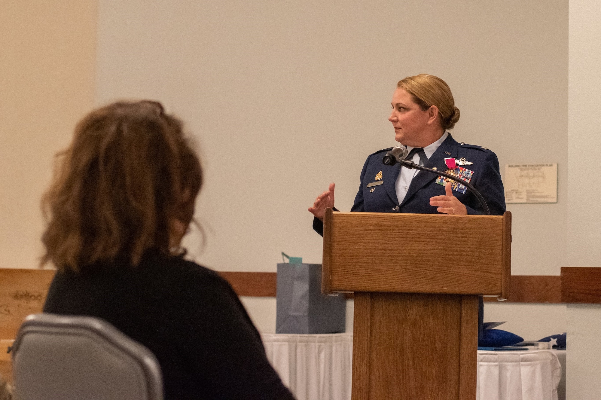 U.S. Air Force Col. Shelley Woodworth, right, stands with her husband U.S. Air Force Col. Travis Woodworth, center, and U.S. Air Force Lt. Gen. Jim Slife, Air Force Special Operations Commander, during her retirement ceremony on Nov. 24, 2020.