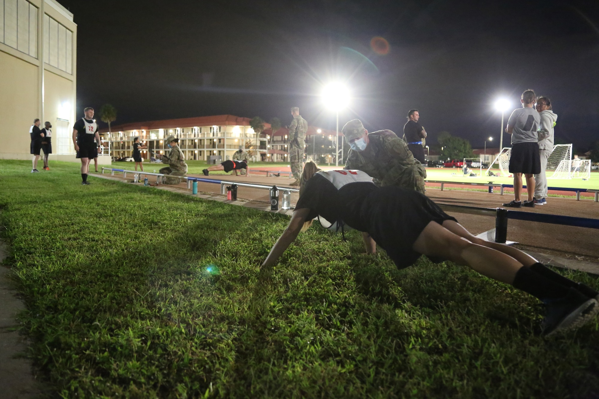Soldiers from United States Central Command execute the pushup portion of the last Army Physical Fitness Test that will be conducted before the transition to the Army Combat Fitness Test, Sep. 30, 2020, at the MacDill Fitness Center, MacDill Air Force Base, Florida. The first APFT was conducted in 1982, and has been the Army’s fitness standard for the last 40 years. (U.S. Army photo by Spc. Robert Vicens)