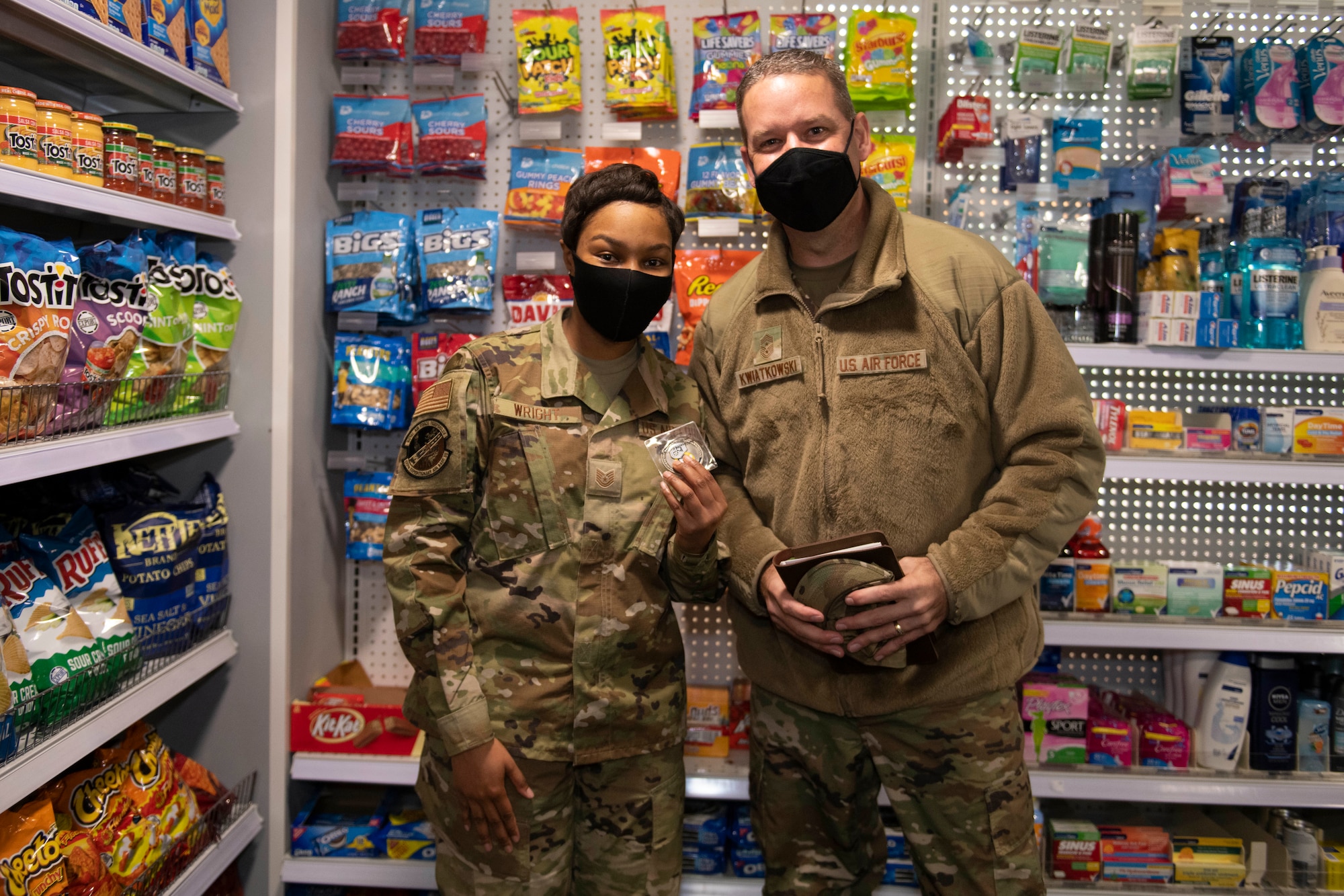 U.S. Air Force Chief Master Sgt. Randy Kwiatkowski, right, Third Air Force command chief, poses for a photo with Tech. Sgt. Tiara Wright, left, 420th Expeditionary Air Base Squadron financial operations flight chief and officer in charge of base AAFES troop store, at the Army and Air Force Exchange Service shoppette at Royal Air Force Fairford, England, Oct. 28, 2020. The Third Air Force command team toured six bases in the 501st Combat Support Wing as part of a new commander’s immersion tour. (U.S. Air Force photo by Senior Airman Jennifer Zima)