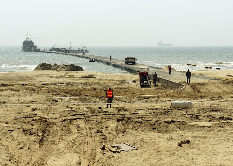 A U.S. Army Landing Craft Utility 2000 offloads equipment to a Trident Pier at Anmyeon Beach on the west coast of the Republic of Korea during exercise Combined Joint Logistics Over-the-Shore (LOTS) 2015.  CJLOTS 2015 is an exercise designed to train U.S. and ROK service members to accomplish vital logistical measures in a strategic area while strengthening communication and cooperation in the U.S.-ROK alliance.
