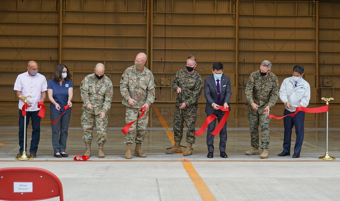 U.S. Army Corps of Engineers — Japan District commander, Col. Thomas J. Verell Jr., (third from left) cuts the ribbon alongside U.S. military leaders and Tokyu Construction Company representatives during a ribbon cutting ceremony on Kadena Air Base, Okinawa, Japan, Nov. 24, 2020.