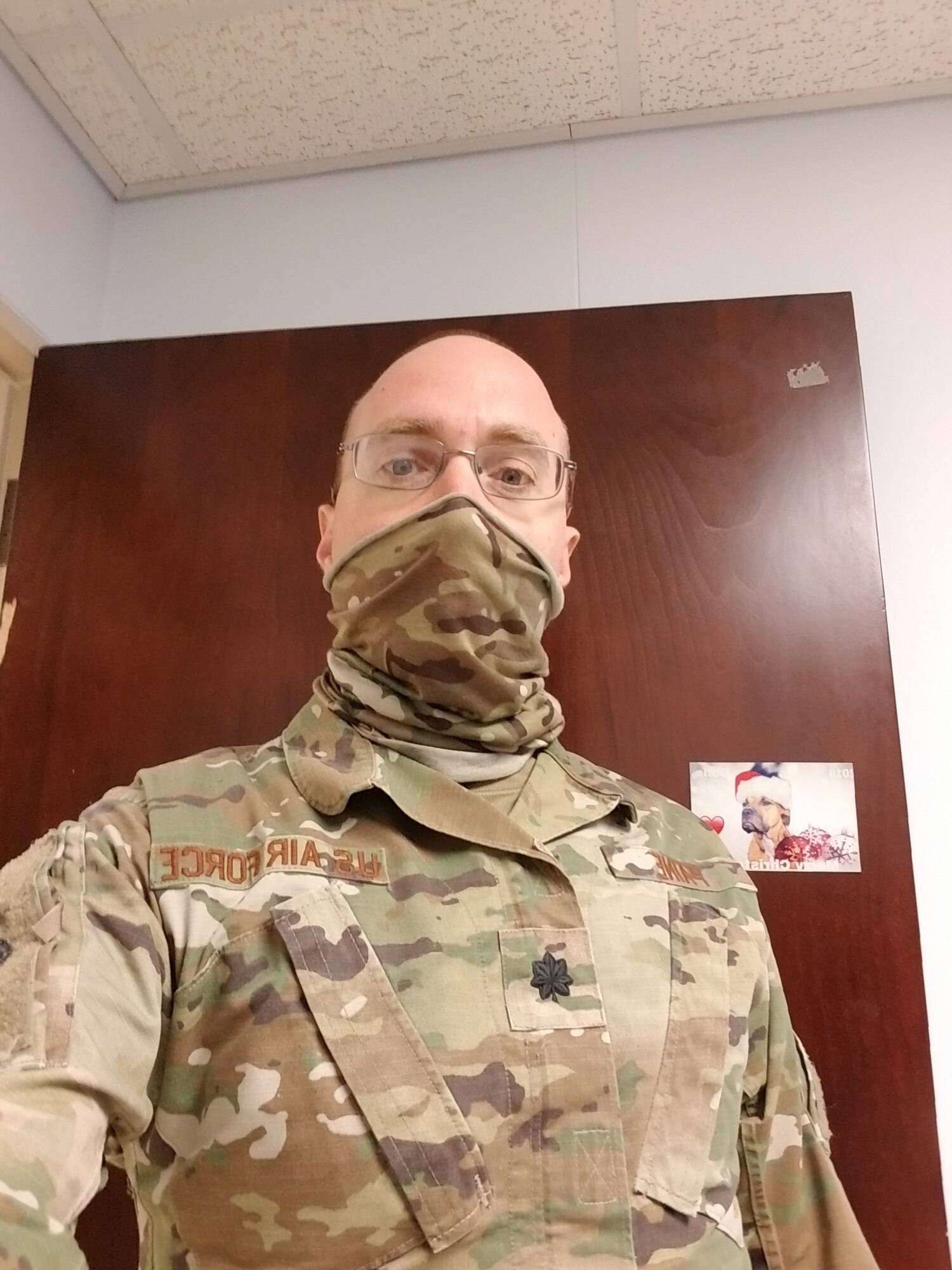 Man in uniform with mask.