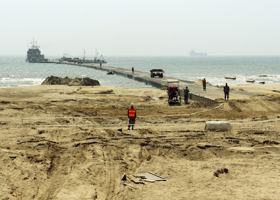 A U.S. Army Landing Craft Utility 2000 offloads equipment to a Trident Pier at Anmyeon Beach on the west coast of the Republic of Korea during exercise Combined Joint Logistics Over-the-Shore (LOTS) 2015.  CJLOTS 2015 is an exercise designed to train U.S. and ROK service members to accomplish vital logistical measures in a strategic area while strengthening communication and cooperation in the U.S.-ROK alliance.