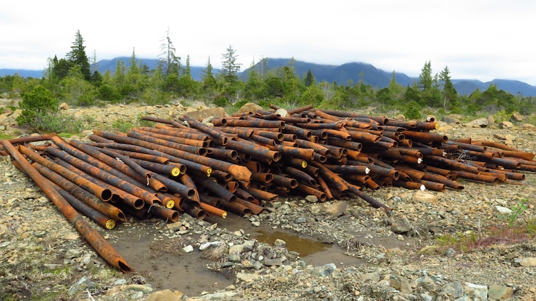 Removed pipeline sits in a pile waiting to be removed from Annette Island as part of cleanup effort accomplished by the Metlakatla Indian Community under the Native American Lands Environmental Mitigation Program.