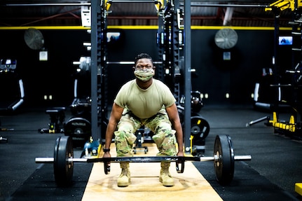 Staff Sgt. Roger Jackson trains for the Army Combat Fitness Test by honing his dead lift skills Nov. 7, 2020, at Fort Lee, Virginia.