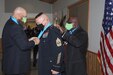 Retired Brig. Gen. Wilbur E. Wolf III (left) and retired Command Sgt. Maj. Anthony Browning (right) present Command Sgt. Maj. Richard A. Huff, Command Sgt. Maj., Letterkenny Army Depot, (center) with the Knowlton Award on behalf of the Military Intelligence Corps Association during the retirement ceremony in honor of Huff's 32 years of military service on November 19, 2020.