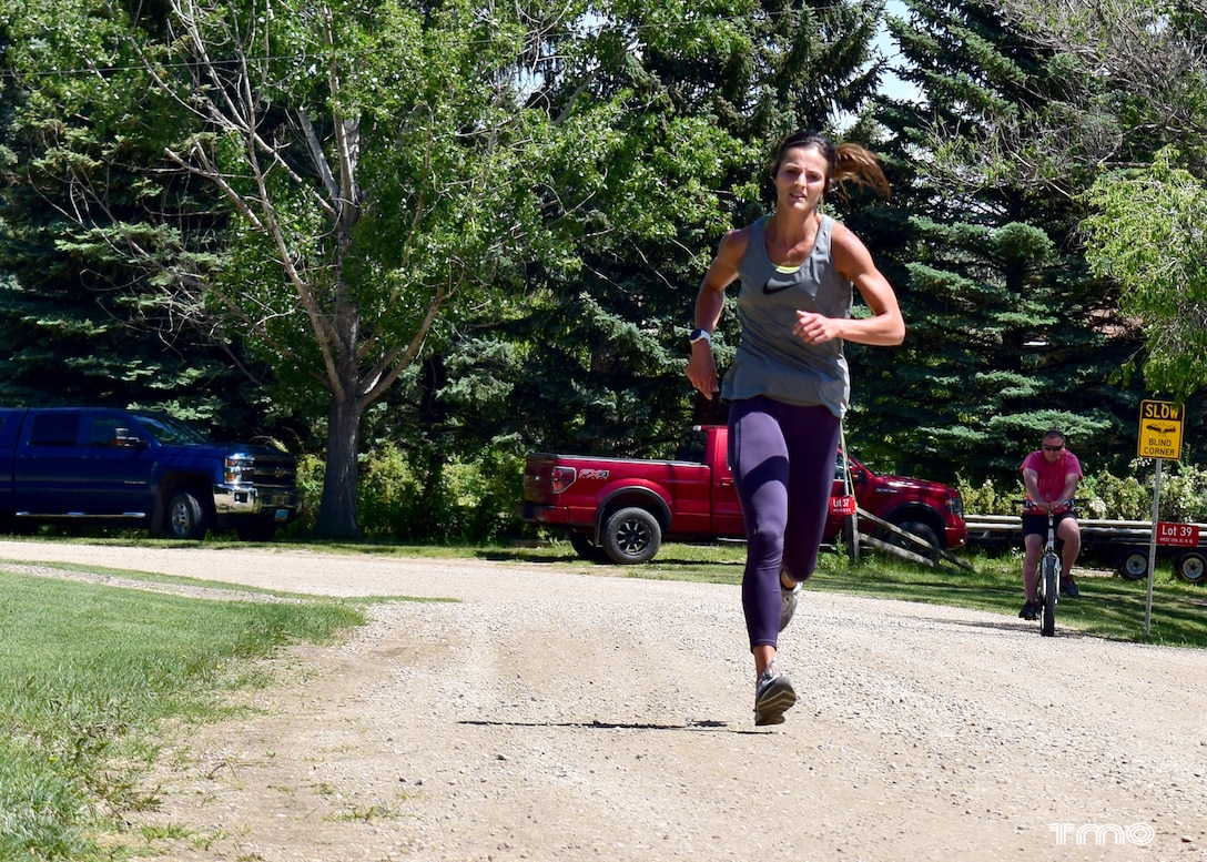 Runner in the Hide Away Bay 5K Race trails the Douglas Creek Recreation Area at Lake Sakakawea in North Dakota, June 20, 2020.