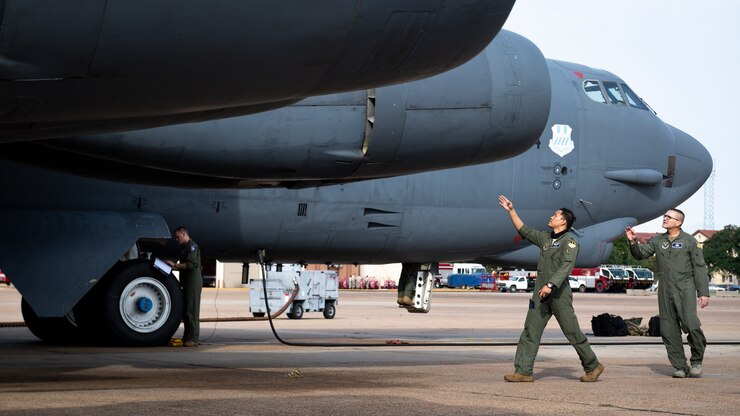 Capt. John “Heater” Alora, 20th Bomb Squadron pilot, shows Chief Master Sgt. Brent “Chip” Chadick, 2nd Bomb Wing command chief, how to perform preflight inspections on a B-52H Stratofortress at Barksdale Air Force Base, La., Sept. 2, 2020.