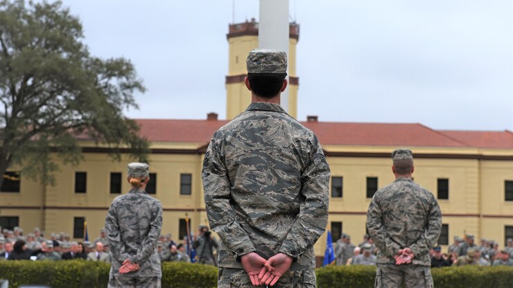 Bomber Airmen from across the country gather around the 2nd Bomb Wing flag pole for a retreat ceremony at Barksdale Air Force Base, La., Feb. 2, 2016.