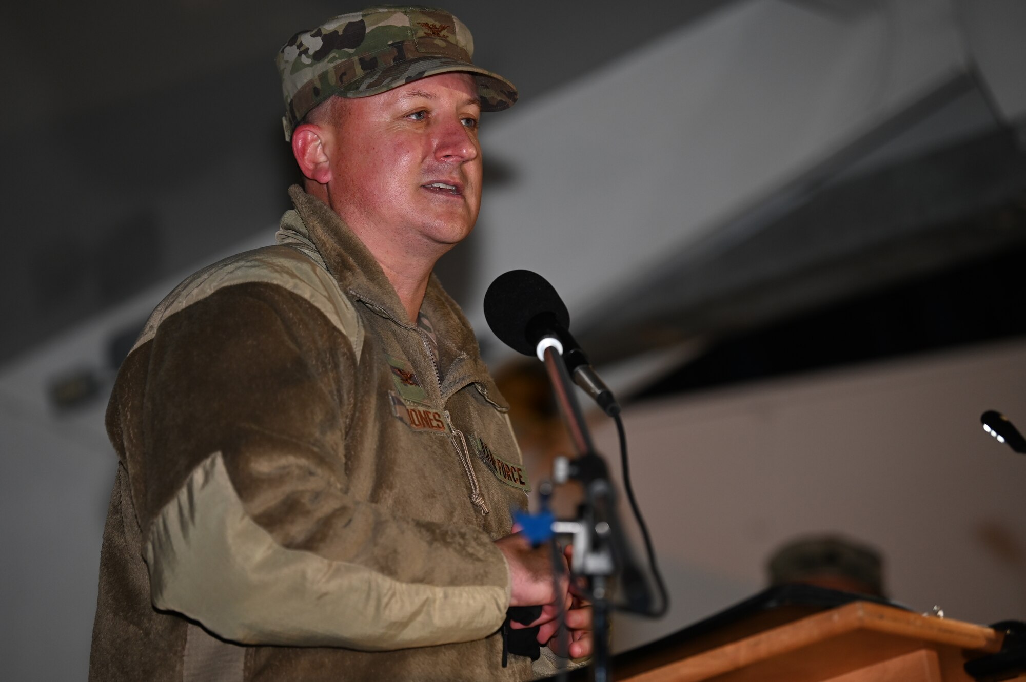Col. Matthew Jones, 436th Airlift Wing commander, wishes Airmen and their families a safe and happy holiday at the tree-lighting ceremony Dec. 1, 2020, at Chapel 2 on Dover Air Force Base, Delaware. The ceremony included a Christmas concert, speeches from several Dover AFB leaders, a surprise visit from Santa Claus, and the lighting of the base Christmas tree.(U.S. Air Force photo by Airman Cydney Lee)
