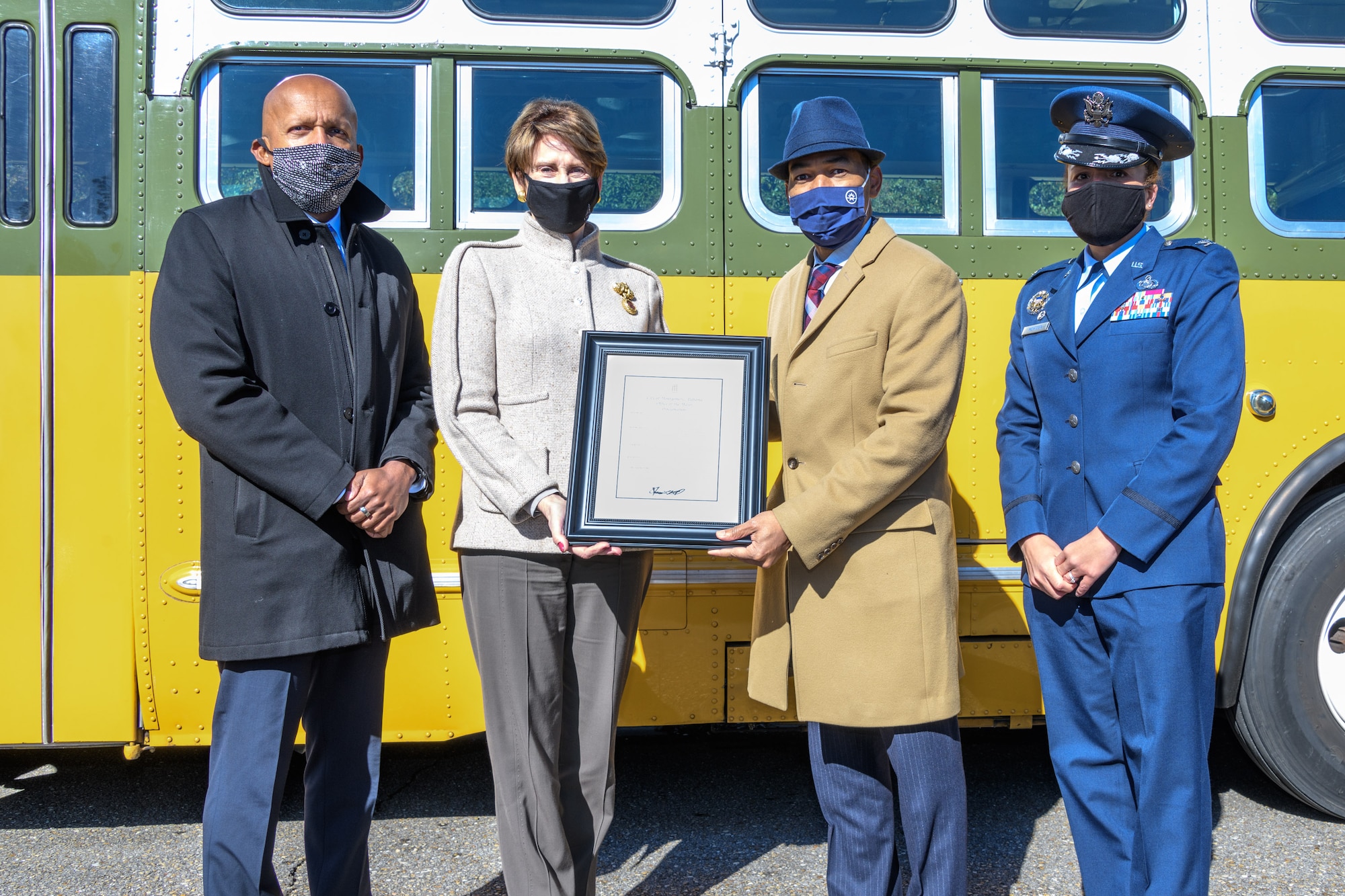 Bryan Stevenson, Equal Justice Initiative director (left), Secretary of the Air Force Barbara Barrett, Mayor of Montgomery Steven Reed and Col. Eries Mentzer, 42nd Air Base Wing commander, pose for a photo on Maxwell Air Force Base, Alabama, Dec. 1, 2020, the 65th anniversary of her arrest for refusing to give up her seat on a Montgomery bus. The event marks the start of a 382-day partnership between Maxwell and the city of Montgomery. The partnership’s aim is to focus on diversity and inclusion so everyone can “rise to their best,” said Mentzer. To make this possible, she formed the Freedom to Serve Initiative, a team of Airmen whose goal is to identify and find solutions to obstacles that may impede Airmen’s success. (U.S. Air Force photo by Trey Ward)