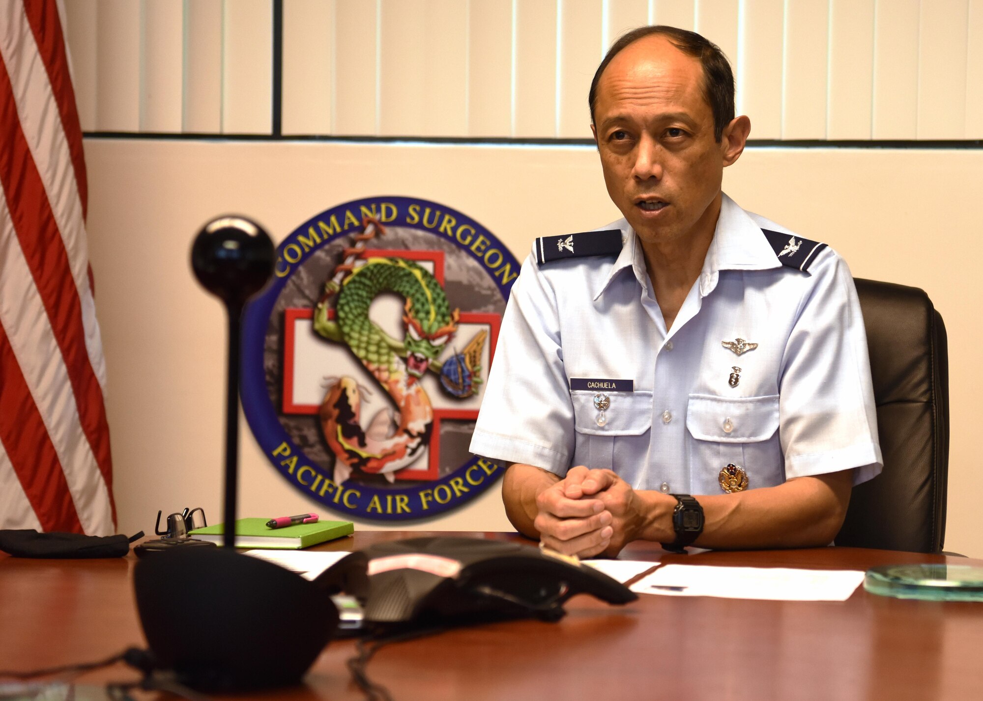 U.S. Air Force Col. Rudy Cachuela, Pacific Air Forces command surgeon virtually hosts an Aerospace Medicine virtual knowledge exchange with medical experts from the Royal Australian Air Force and Royal Thai Air Force, at Joint Base Pearl Harbor-Hickam, Hawaii, Nov. 23, 2020.  The exchange focused on highlighting current best practices in aviation medicine and patient movement to enhance aircrew safety and patient care. (U.S. Air Force photo by Tech. Sgt. Zach Vaughn)