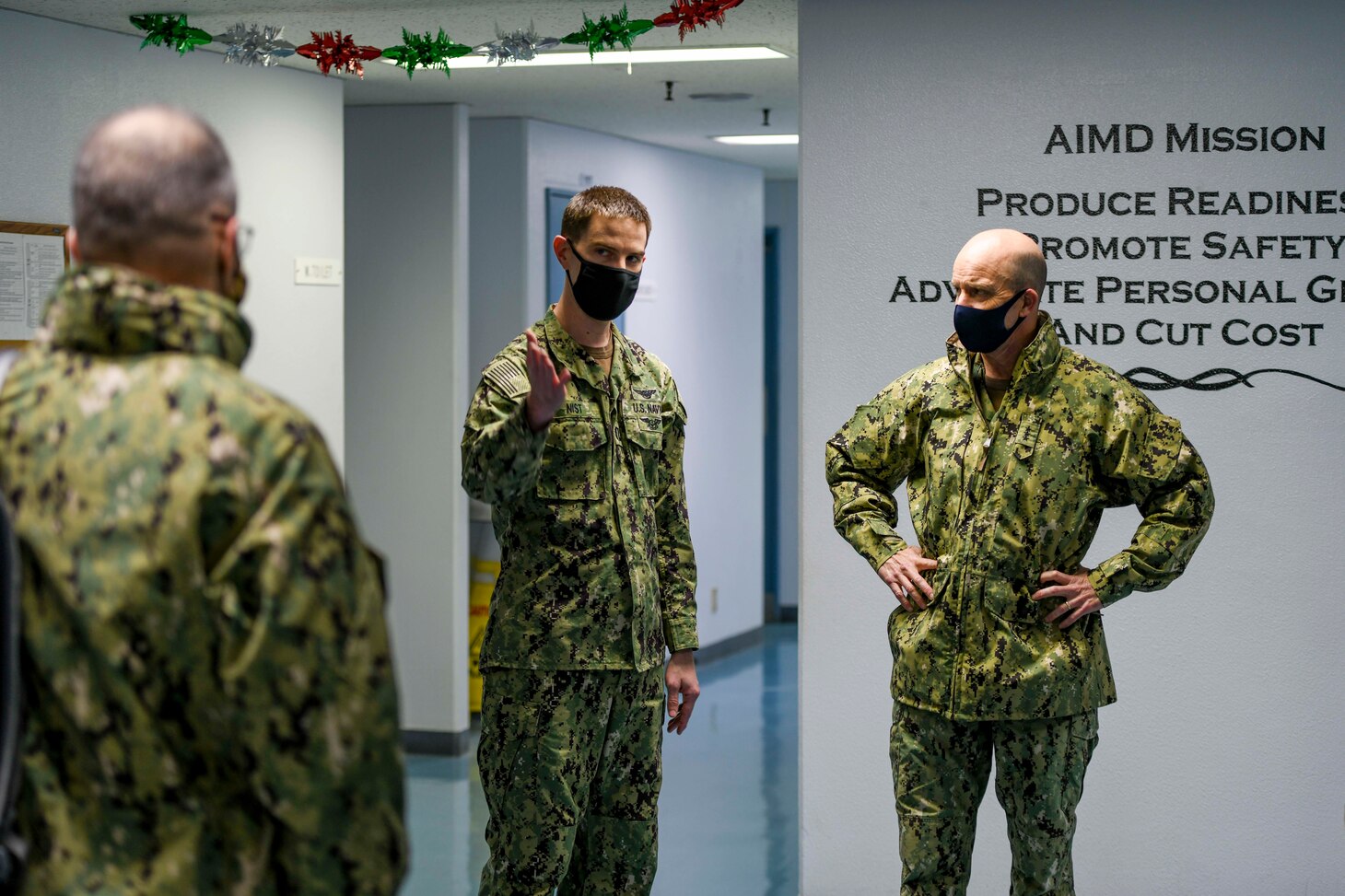MISAWA, Japan (Dec. 2, 2020) – Commander, U.S. 7th Fleet, Vice Adm. Bill Merz, right, speaks with Officer in Charge of Aviation Intermediate Maintenance Detachment Misawa Lt. Kevin Nist during a visit to Naval Air Facility (NAF) Misawa. Merz is conducting fleet circulation visits to NAF Atsugi and NAF Misawa with a focus on discussing the U.S. 7th Fleet Warfighting Concepts and engagement with tenant commands and rotational deployers. U.S. 7th Fleet conducts forward-deployed naval operations in support of U.S. national interests in the Indo-Pacific area of operations. As the U.S. Navy's largest numbered fleet, 7th Fleet interacts with 35 other maritime nations to build partnerships that foster maritime security, promote stability, and prevent conflict. (U.S. Navy photo by Mass Communication Specialist 2nd Class Jan David De Luna Mercado)
