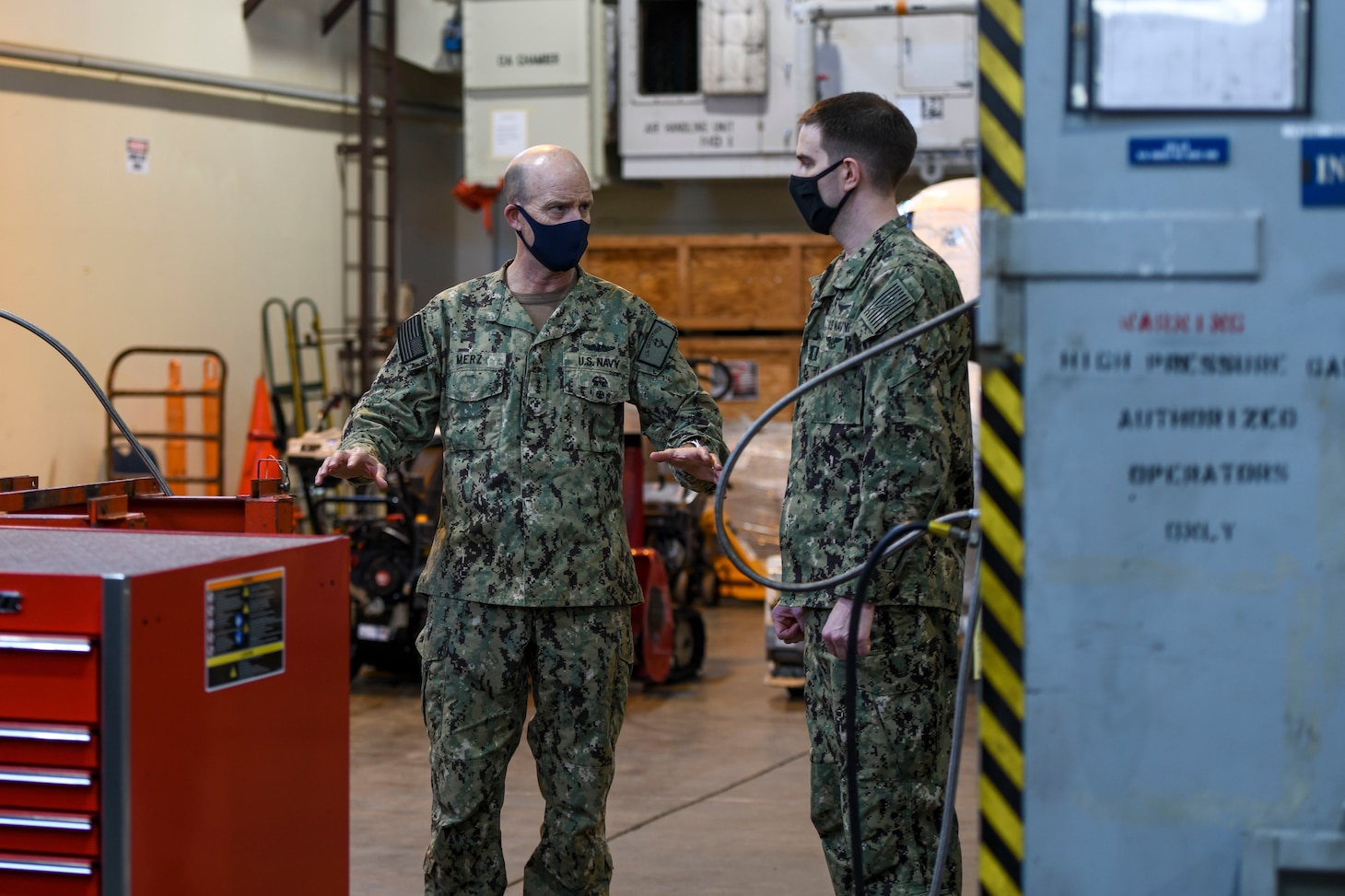 MISAWA, Japan (Dec. 2, 2020) – Commander, U.S. 7th Fleet, Vice Adm. Bill Merz, left, speaks with Officer in Charge of Aviation Intermediate Maintenance Detachment Misawa Lt. Kevin Nist during a visit to Naval Air Facility (NAF) Misawa. Merz is conducting fleet circulation visits to NAF Atsugi and NAF Misawa with a focus on discussing the U.S. 7th Fleet Warfighting Concepts and engagement with tenant commands and rotational deployers. U.S. 7th Fleet conducts forward-deployed naval operations in support of U.S. national interests in the Indo-Pacific area of operations. As the U.S. Navy's largest numbered fleet, 7th Fleet interacts with 35 other maritime nations to build partnerships that foster maritime security, promote stability, and prevent conflict.