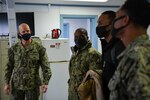 MISAWA, Japan (Dec. 2, 2020) – Commander, U.S. 7th Fleet, Vice Adm. Bill Merz, left, tours Aviation Support Division (ASD) Misawa during a visit to Naval Air Facility (NAF) Misawa. Merz is conducting fleet circulation visits to NAF Atsugi and NAF Misawa with a focus on discussing the U.S. 7th Fleet Warfighting Concepts and engagement with tenant commands and rotational deployers. U.S. 7th Fleet conducts forward-deployed naval operations in support of U.S. national interests in the Indo-Pacific area of operations. As the U.S. Navy's largest numbered fleet, 7th Fleet interacts with 35 other maritime nations to build partnerships that foster maritime security, promote stability, and prevent conflict.