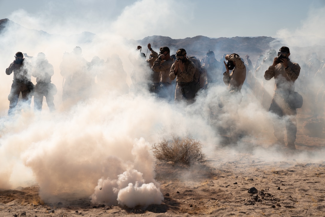 U.S. Marines utilize M50 gas masks during a chemical, biological, radiological and nuclear defense training exercise at Marine Corps Air Ground Combat Center, Twentynine Palms, California, Nov. 19.