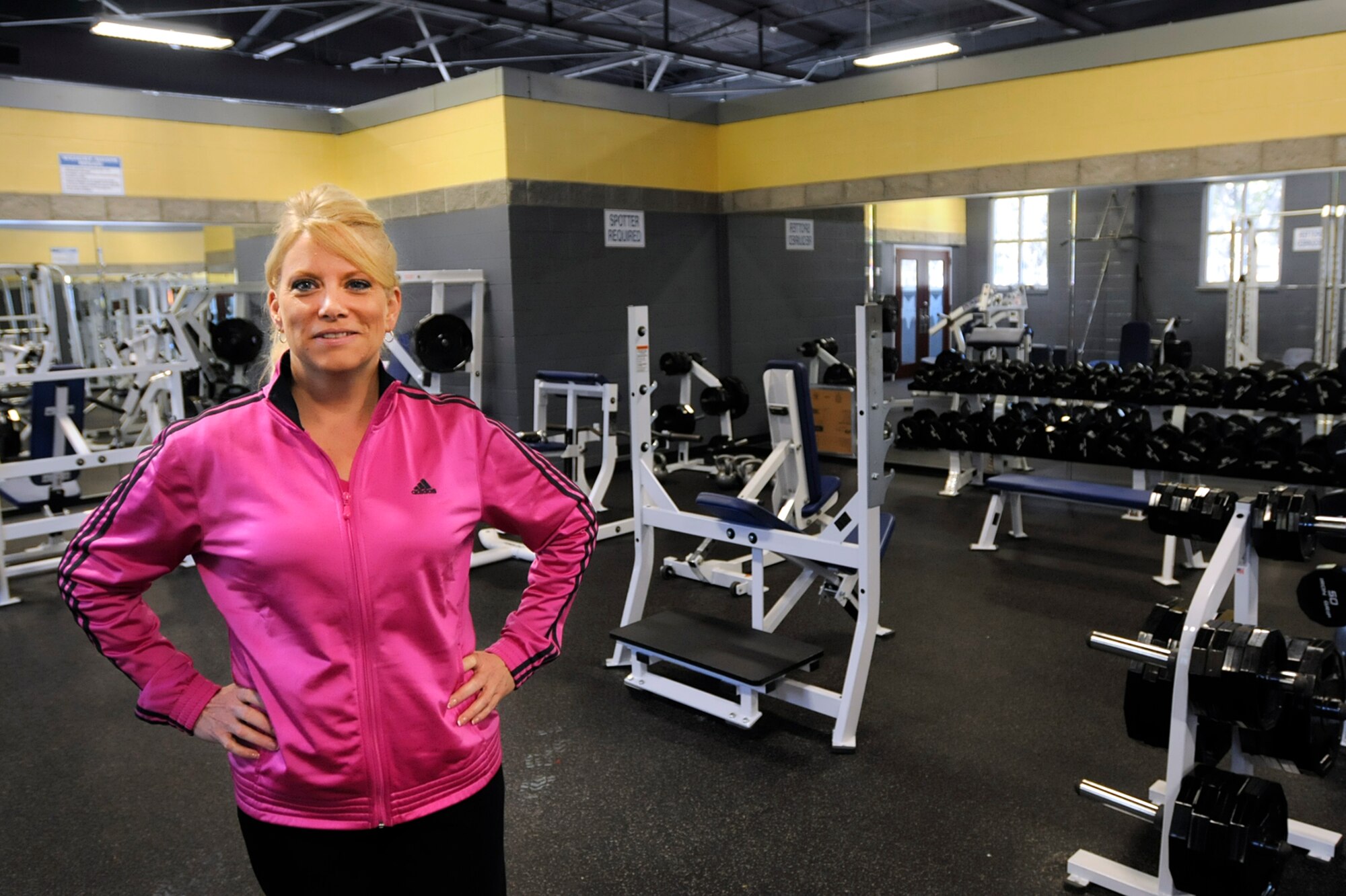 Michelle Walker, the Recreational Specialist at McEntire Joint National Guard Base, S.C., poses for her photo in the base gym on November 2, 2011.  Michelle was hired to work at the base gym to train, educate and encourage McEntire�s airmen to remain �fit to fight� and excel in the new Air Force fitness standards. 
(SCANG photo by TSgt Caycee Cook)