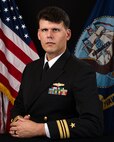 Official portrait of Lt. Cmdr. Jason M. Wittrock, officer-in-charge, U.S. Navy Information Operation Detachment, Korea.