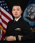 Official portrait of Lt. Cuong T. Le, assistant officer-in-charge, U.S. Navy Information Operation Detachment, Korea.