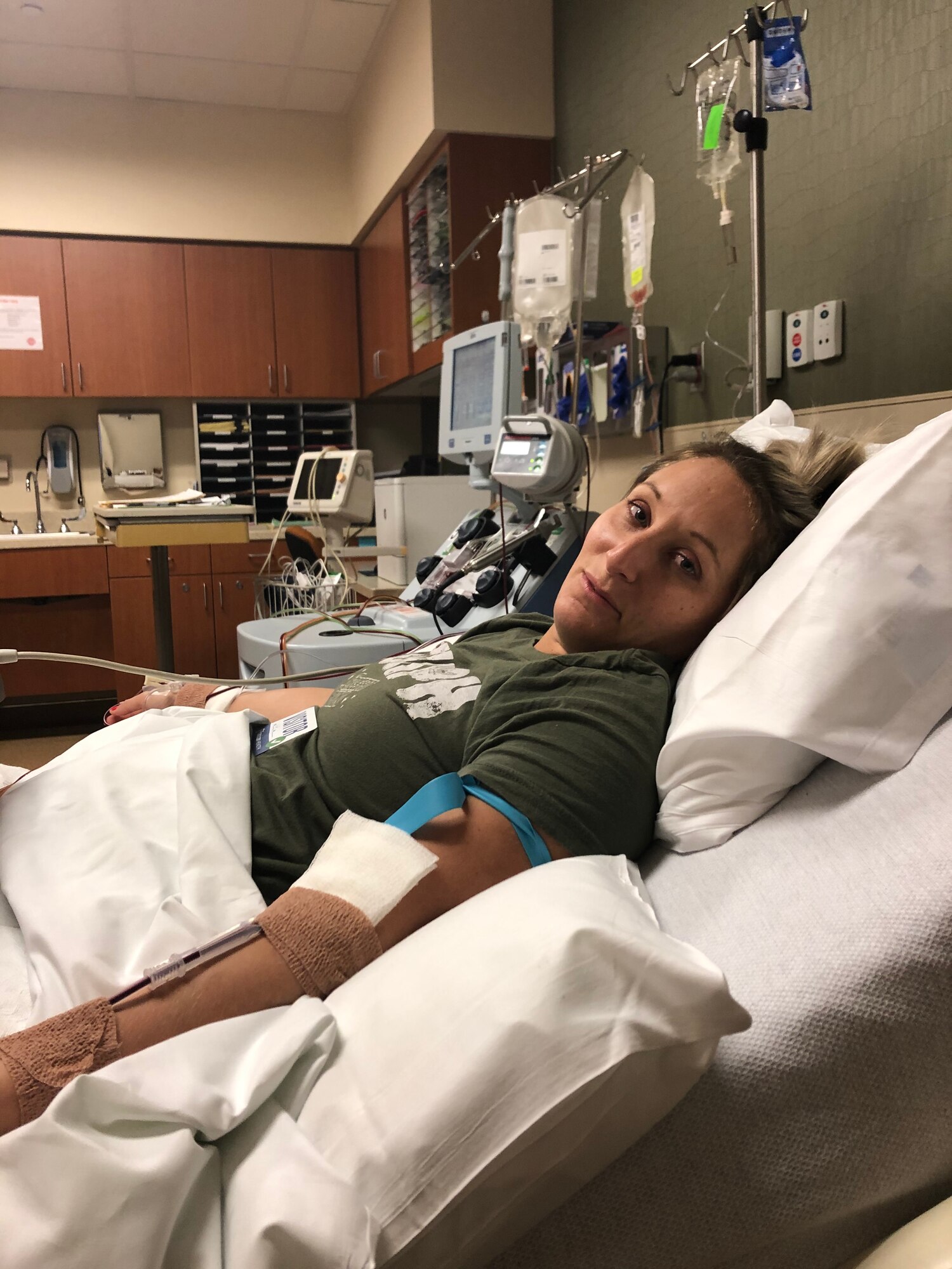 Master Sgt. Ashley Stant, 434th Force Support Squadron personnel systems manager, lies in a hospital bed at St. Franciscan Hospital in Greenwood, Indiana on Sept. 9, 2020 in preparation to donate bone marrow. Stant was selected as a bone marrow match for a 63 year old male patient with myelogenous leukemia. (Courtesy Photo)
