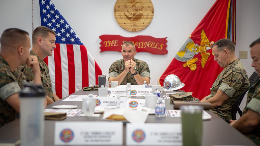U.S. Marine Corps Lt. Gen. Karsten S. Heckl, center, the commanding general of I Marine Expeditionary Force (MEF), is briefed during a visit at the I MEF Information Group (MIG) headquarters building at Marine Corps Base Camp Pendleton, California, Aug. 19, 2020. I MIG is committed to meeting the expeditionary requirements of our commanders, and improving readiness in the information environment. I MIG showcased its support to I MEF exercises, deployments, and operations in the information environment. (U.S. Marine Corps photo by Cpl. Tia Carr)