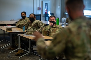 A Soldier speaks to students of a Master Resilience Training class.
