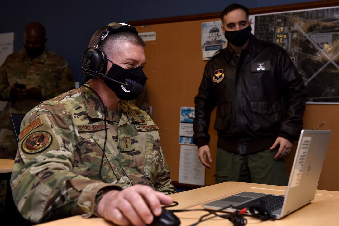 U.S. Air Force Maj. Gen. William Spangenthal, Air Education and Training Command deputy commander, logs into a virtual classroom while touring the 316th Training Squadron dorms on Goodfellow Air Force Base, Texas, Dec. 1, 2020. March marked the beginning of transitioning course material to a virtual due to COIVD-19. (U.S. Air Force photo by Staff Sgt. Seraiah Wolf)