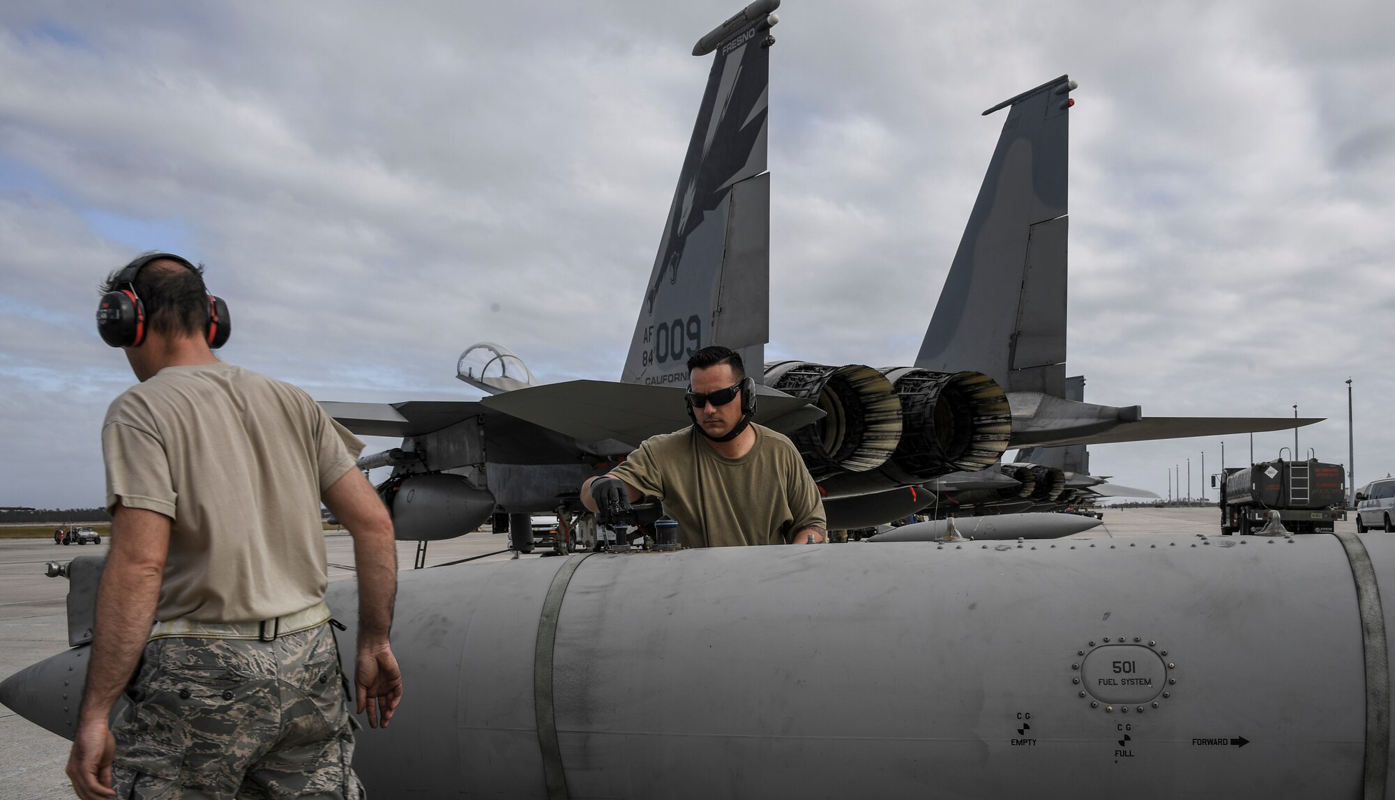 Tech. Sgt. Cory Snyder, 144th Maintenance Squadron, prepares an external fuel tank to be loaded on a U.S. Air Force F-15C Eagle fighter jet during Checkered Flag, Tyndall Air Force Base, Florida, Nov. 9, 2020.