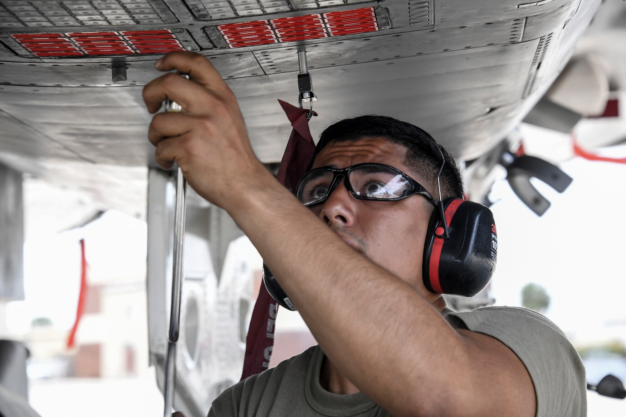 Airman 1st Class Jesus Molina-Serrato, 144th Maintenance Squadron, checks the countermeasures of a U.S. Air Force F-15C Eagle fighter jet after it returned from a sortie during Checkered Flag, Tyndall Air Force Base, Florida, Nov. 9, 2020.