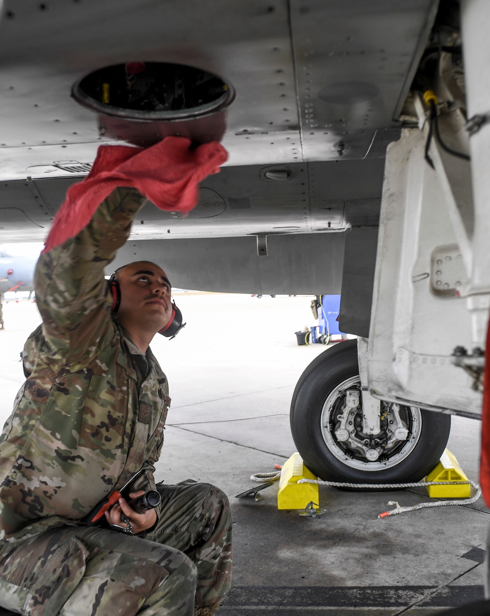 Airman 1st Class Bailey Zavala prepare a U.S. Air Force F-15C Eagle fighter jet to launch during during the exercise Checkered Flag, Tyndall Air Force Base, Florida, Nov. 10, 2020.