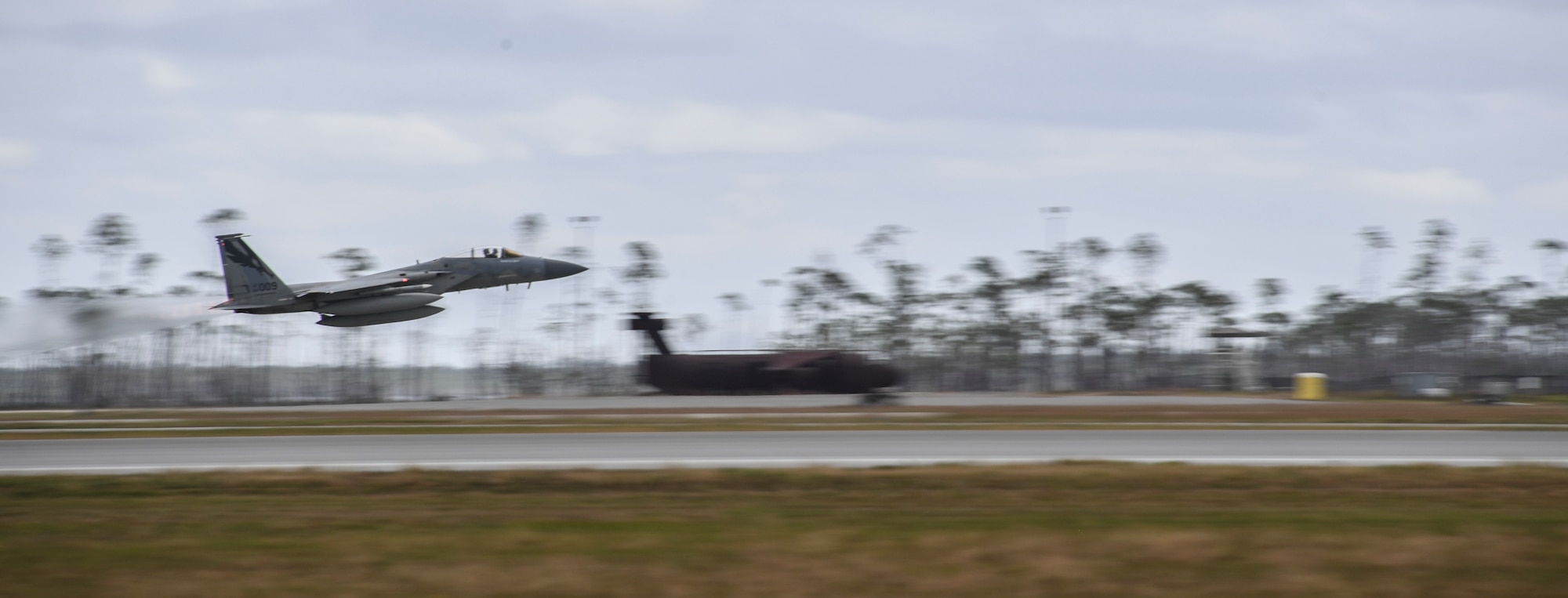 A U.S. Air Force F-15C Eagle fighter jet from the 194th Fighter Squadron, Fresno Air National Guard Base, California, takes off in support of exercise Checkered Flag, Tyndall Air Force Base, Florida, Nov. 10, 2020.