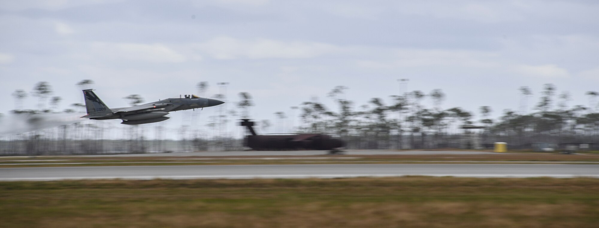 A U.S. Air Force F-15C Eagle fighter jet from the 194th Fighter Squadron, Fresno Air National Guard Base, California, takes off in support of exercise Checkered Flag, Tyndall Air Force Base, Florida, Nov. 10, 2020.