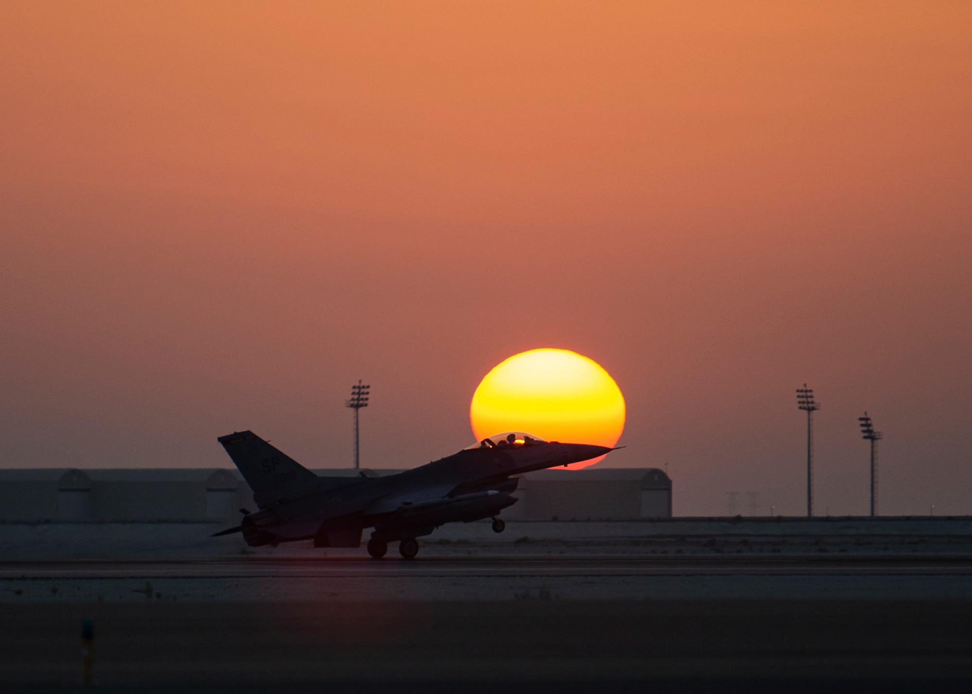 A U.S. Air Force F-16 Fighting Falcon assigned to the 480th Expeditionary Fighter Squadron lands at Al Dhafra Air Base, United Arab Emirates, Dec. 2, 2020. The F-16 is highly maneuverable in air-to-air combat and air-to-surface attack while providing a low-cost, high-performance weapon system for the U.S. and allied nations. (U.S. Air Force photo by Senior Airman Bryan Guthrie)