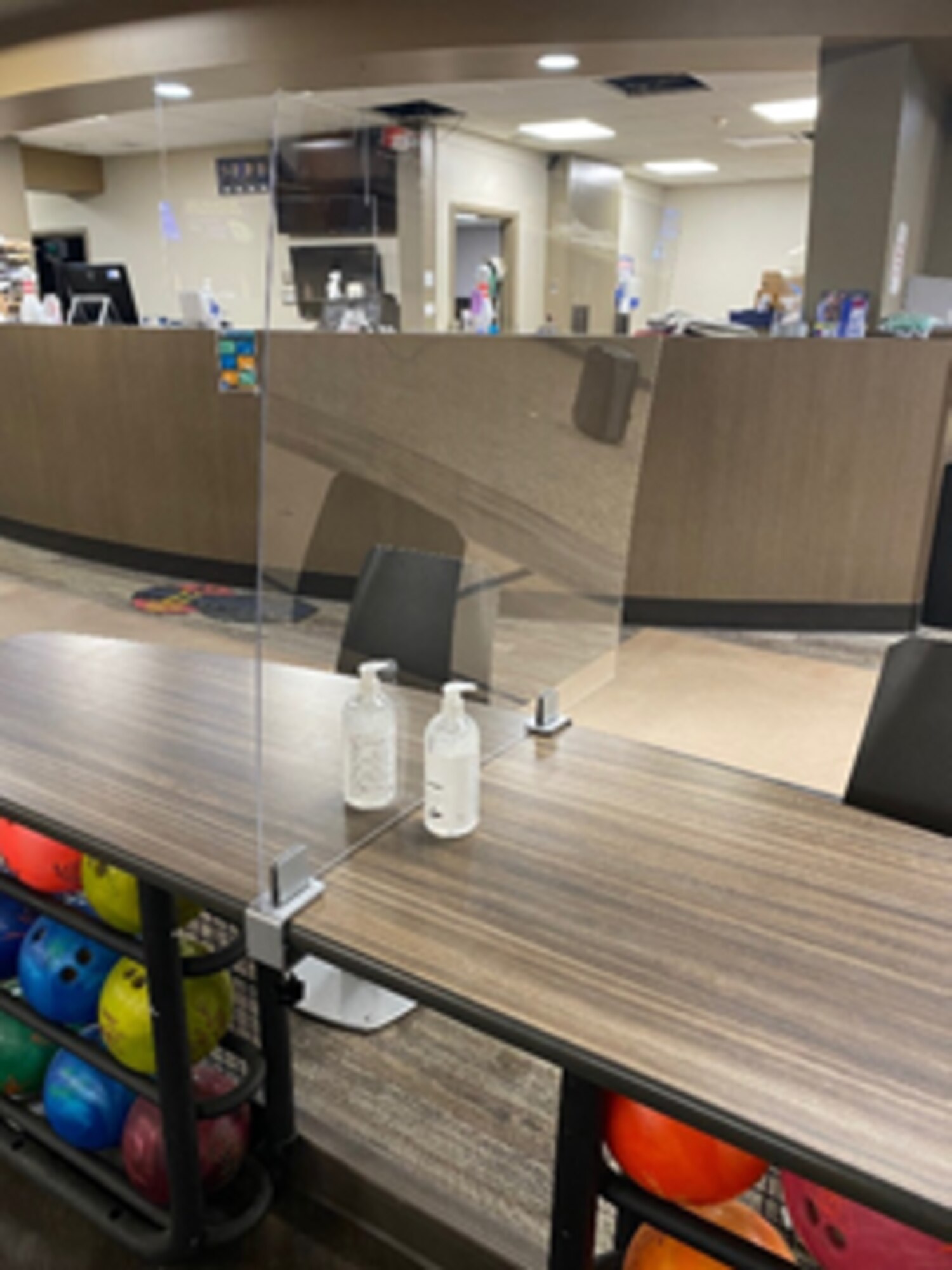 Table dividers w/ hand sanitizer at each table