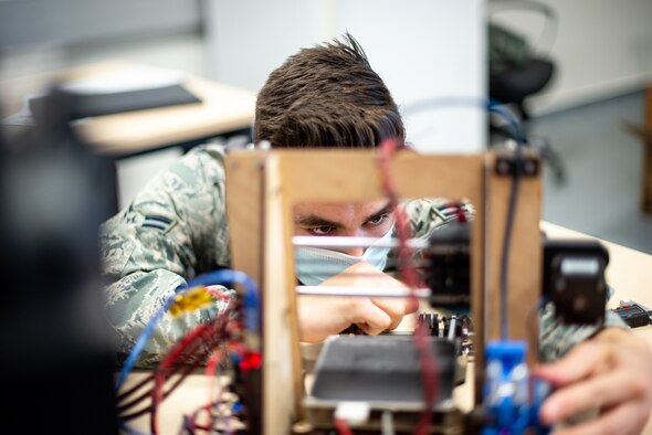 airman works on computer