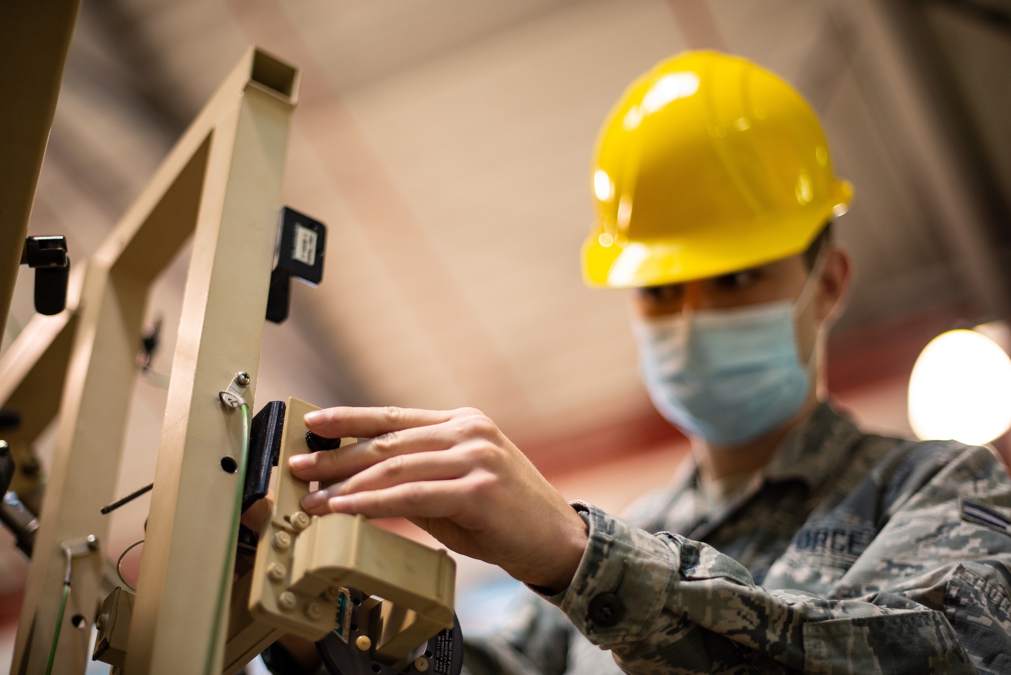 airman builds satellite