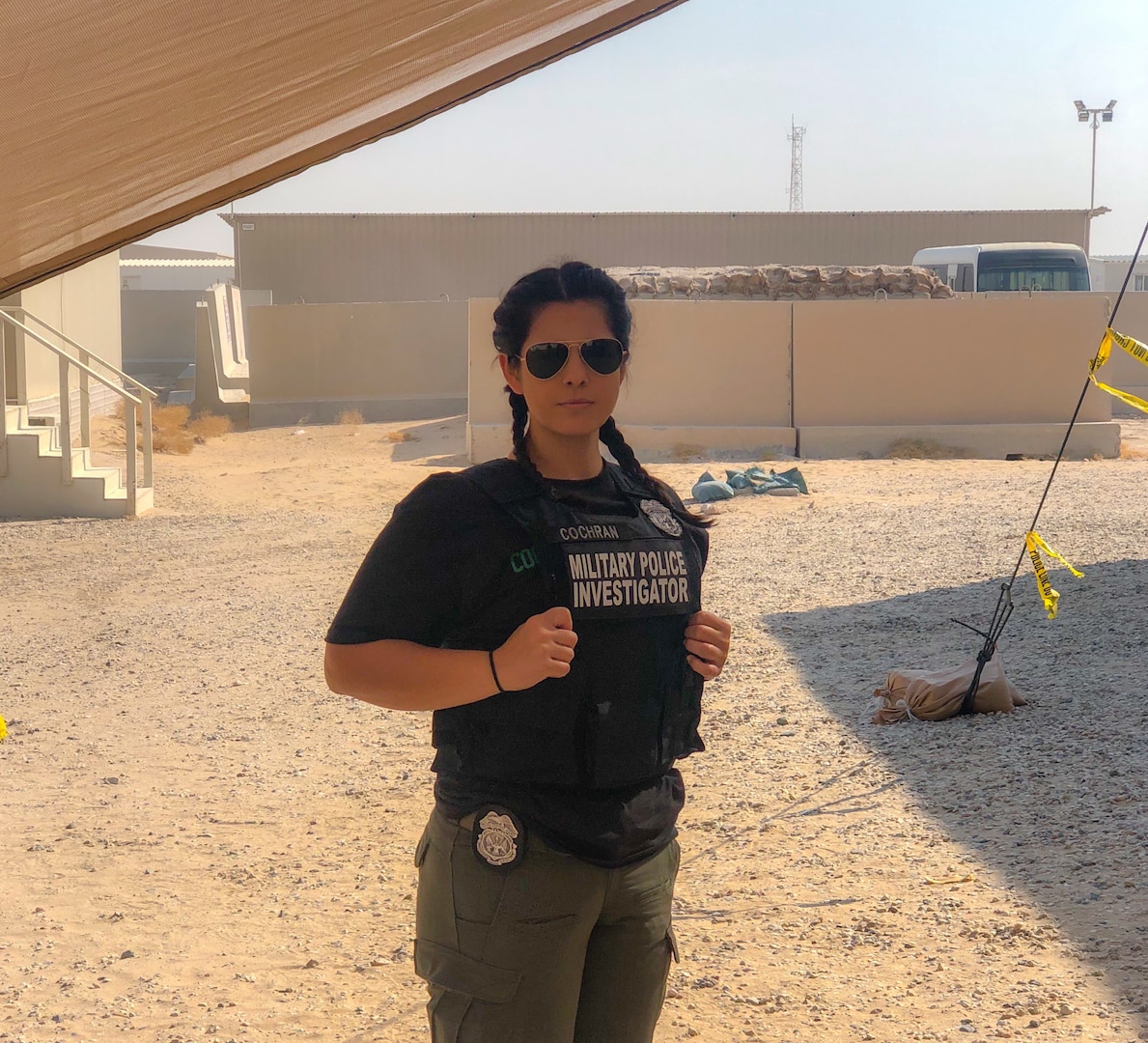 Spc. Alexandria Cochran Kansas City's 1139th Military Police Company, poses in her duty uniform while assigned as a Military Police Investigator deployed in support of the CENTCOM area of operations.