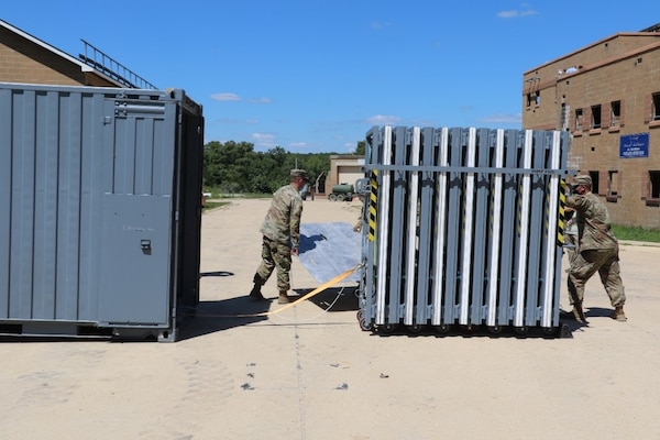 Soldiers deploy the U.S. Army Engineer Research and Development Center’s  Ready Armor Protection for Instant Deployment, or RAPID, full armor configuration at the Maneuver Support, Sustainment and Protection Integration Experiments 2020 (MSSPIX20).