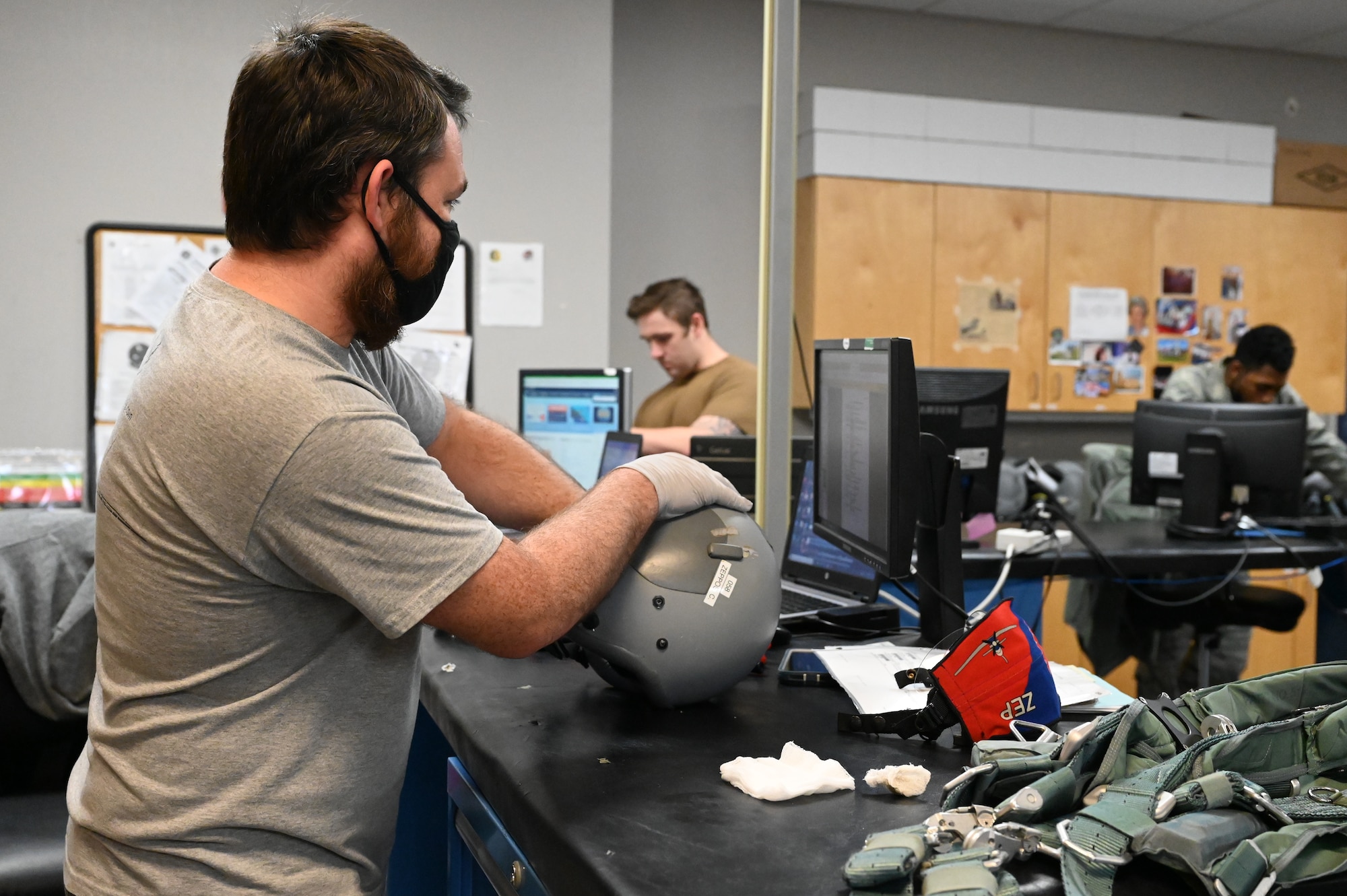 James Reeves, 14th Operations Support Squadron aircrew flight equipment technician, checks equipment to ensure it functions properly, Dec. 2, 2020 on Columbus Air Force Base, Miss. The 14th Operation Support Squadron Aircrew Flight Equipment Flight recently received the Air Education and Training Command Outstanding Air Flight Equipment Small Program of the Year Award. (U.S. Air Force photo by Airman 1st Class Jessica Williams)