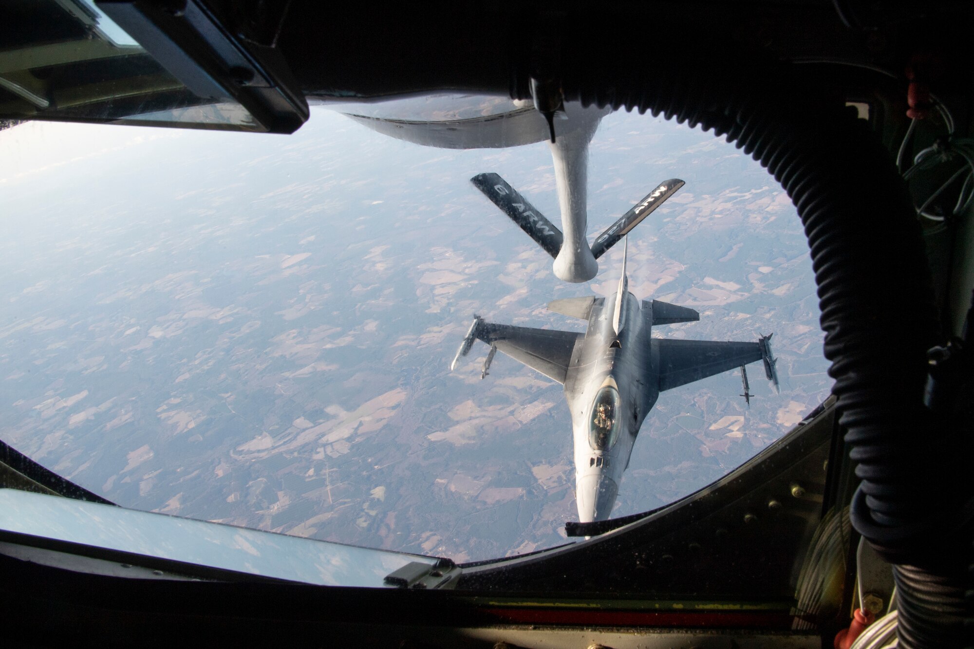 An F-16 Fighting Falcon aircraft assigned to Shaw Air Force Base (AFB), South Carolina, approaches a KC-135 Stratotanker from MacDill AFB, Fla., for air refueling support Dec. 1, 2020.