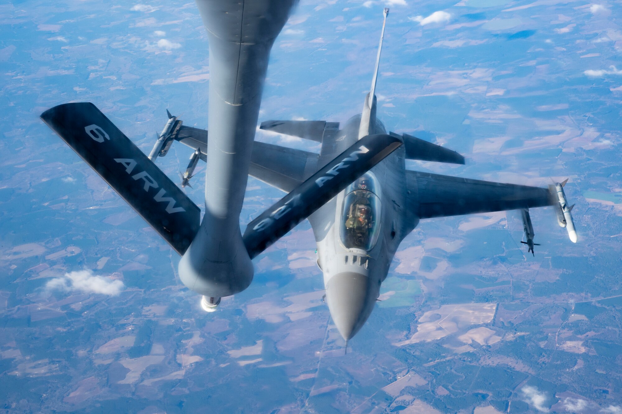 An F-16 Fighting Falcon aircraft assigned to Shaw Air Force Base (AFB), South Carolina, approaches a KC-135 Stratotanker from MacDill AFB, Fla., for air refueling support Dec. 1, 2020.