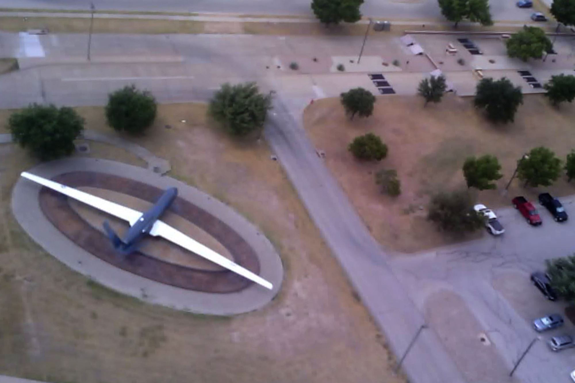 A 17th Security Force Squadron Small Unmanned Aircraft System photo of the static displayed RQ-4 Global Hawk Unmanned Aircraft System on Goodfellow Air Force Base, Texas, September 8, 2020. The use of drones as air superiority not only reduced operating costs, it offered a readiness aspect for unpredictable situations. (U.S. Air Force Small Unmanned Aircraft System courtesy photo)