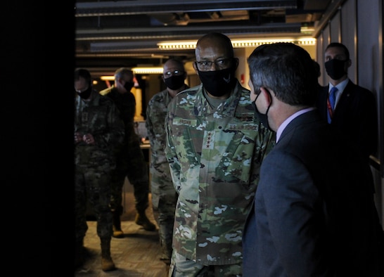 Senior Geospatial Intelligence Analyst David Thompson gives Air Force Chief of Staff Gen. Charles Q. Brown, Jr. an intelligence briefing during the CSAF’s trip to Wright-Patterson Air Force Base, Ohio Dec. 3, 2020. Thompson is a member of the National Geospatial Intelligence Agency Support Team located at NASIC.  Brown’s visit focused heavily on NASIC’s role as a service intelligence center, providing the foundational intelligence required for both the Air Force and Space Force to maintain a competitive advantage. (U.S. Air Force photo by Senior Airman Samuel Earick)