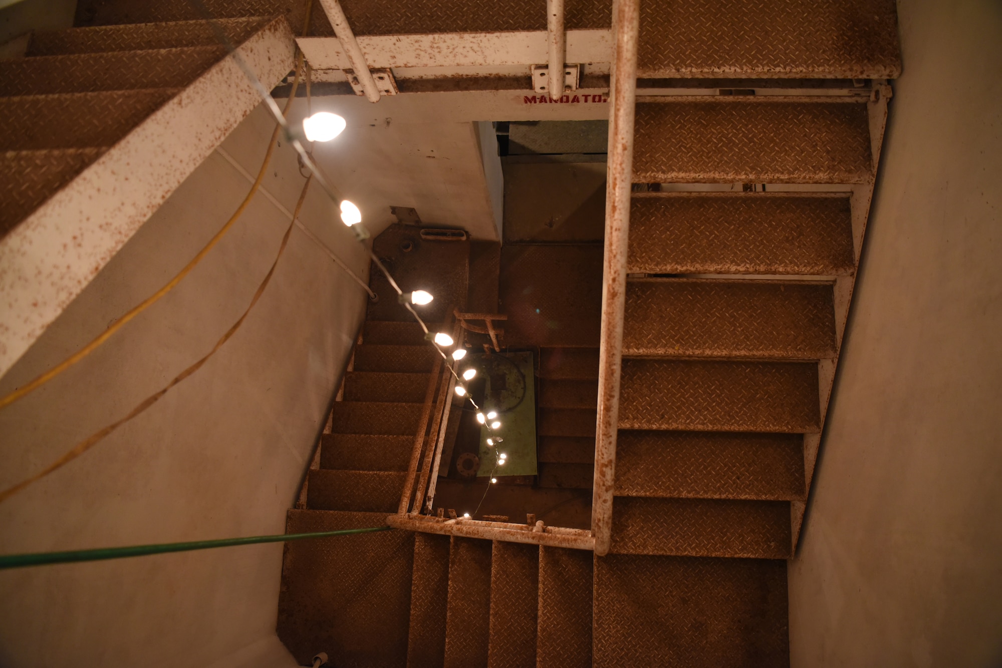 The staircase allows for descending inside the Lawn Atlas Missile Base’s missile silo in Lawn, Texas, Dec. 3, 2020. Built during the Cold War in 1962, the silo housed Atlas, a one-and-a-half stage, liquid-fueled rocket, capable of launching low-orbit payloads.  (U.S. Air Force photo by Senior Airman Abbey Rieves)
