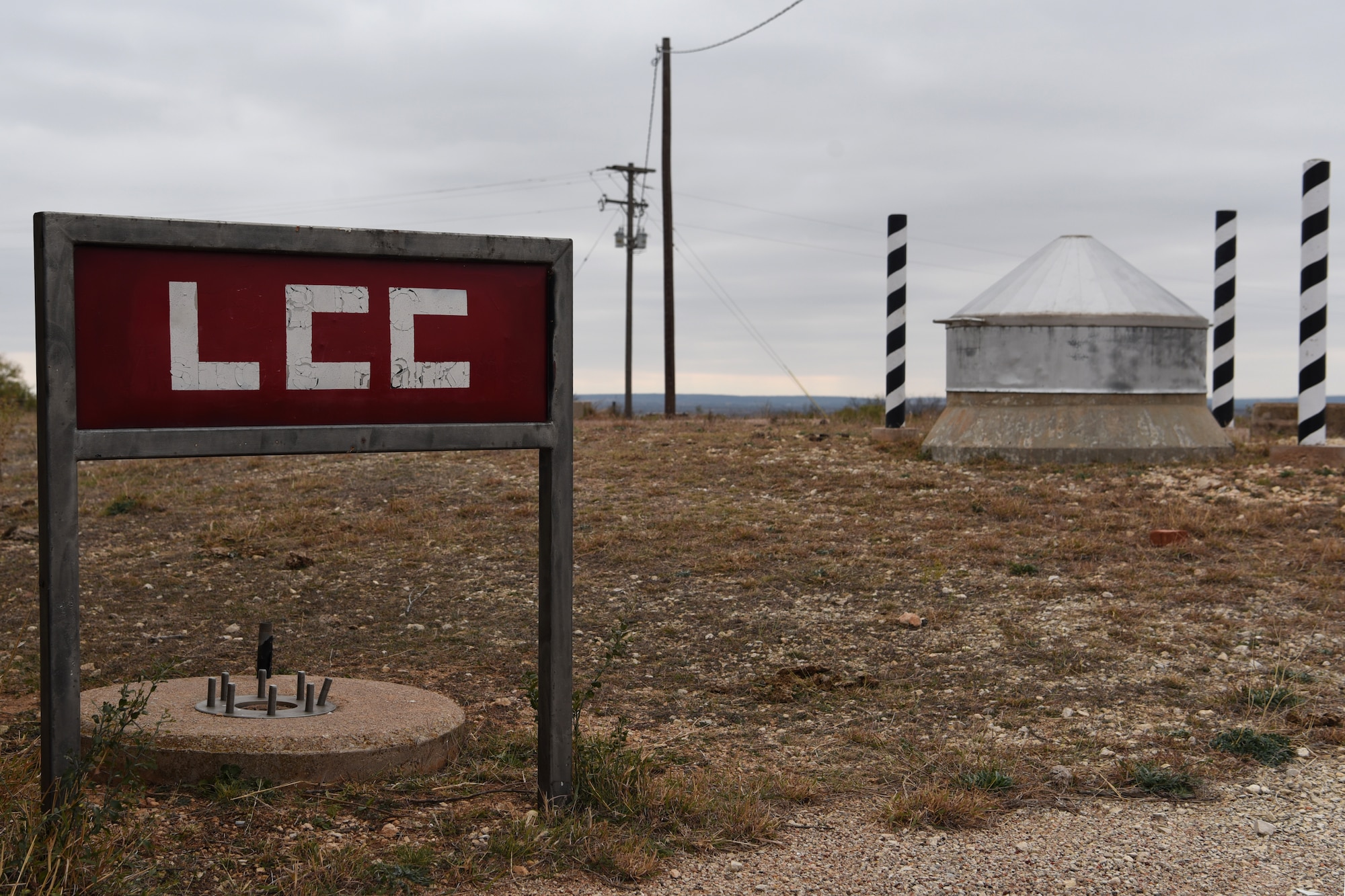 The above ground view of the launch control center’s access point at Lawn Atlas Missile Base’s missile silo in Lawn, Texas, Dec. 3, 2020. The entryway provided access, while support personnel and equipment were housed in two quonset huts for Atlas intercontinental ballistic missile F series during the Cold War in 1962. (U.S. Air Force photo by Senior Airman Abbey Rieves)