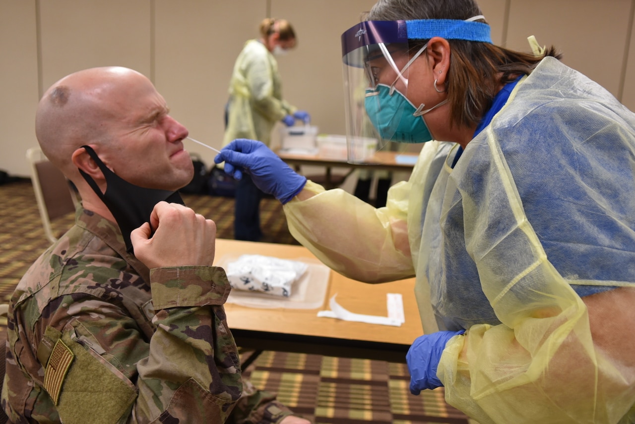 A man is tested for COVID-19.
