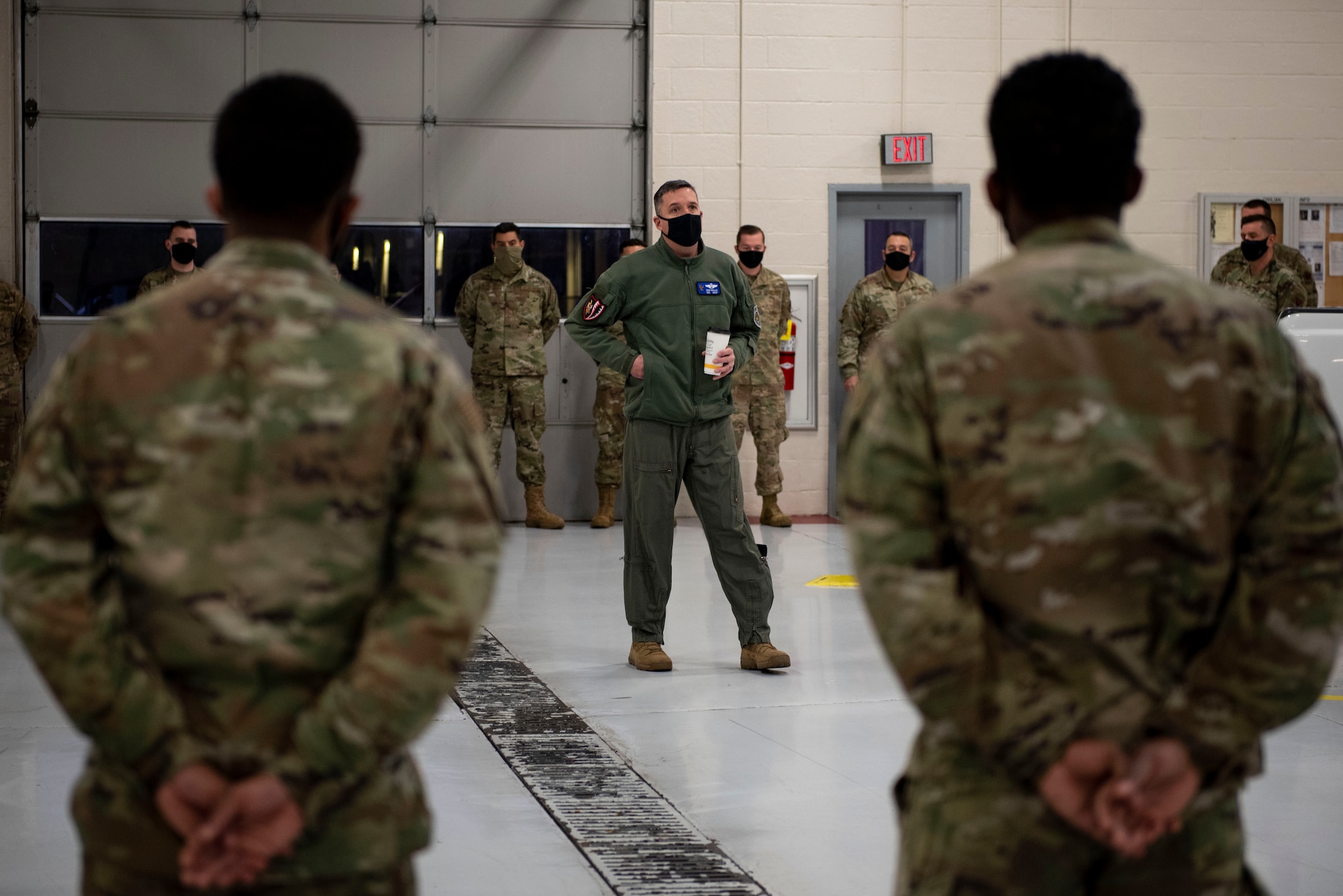 A photo of Col. Dan Walls, 23d Wing commander speaking to Airmen.
