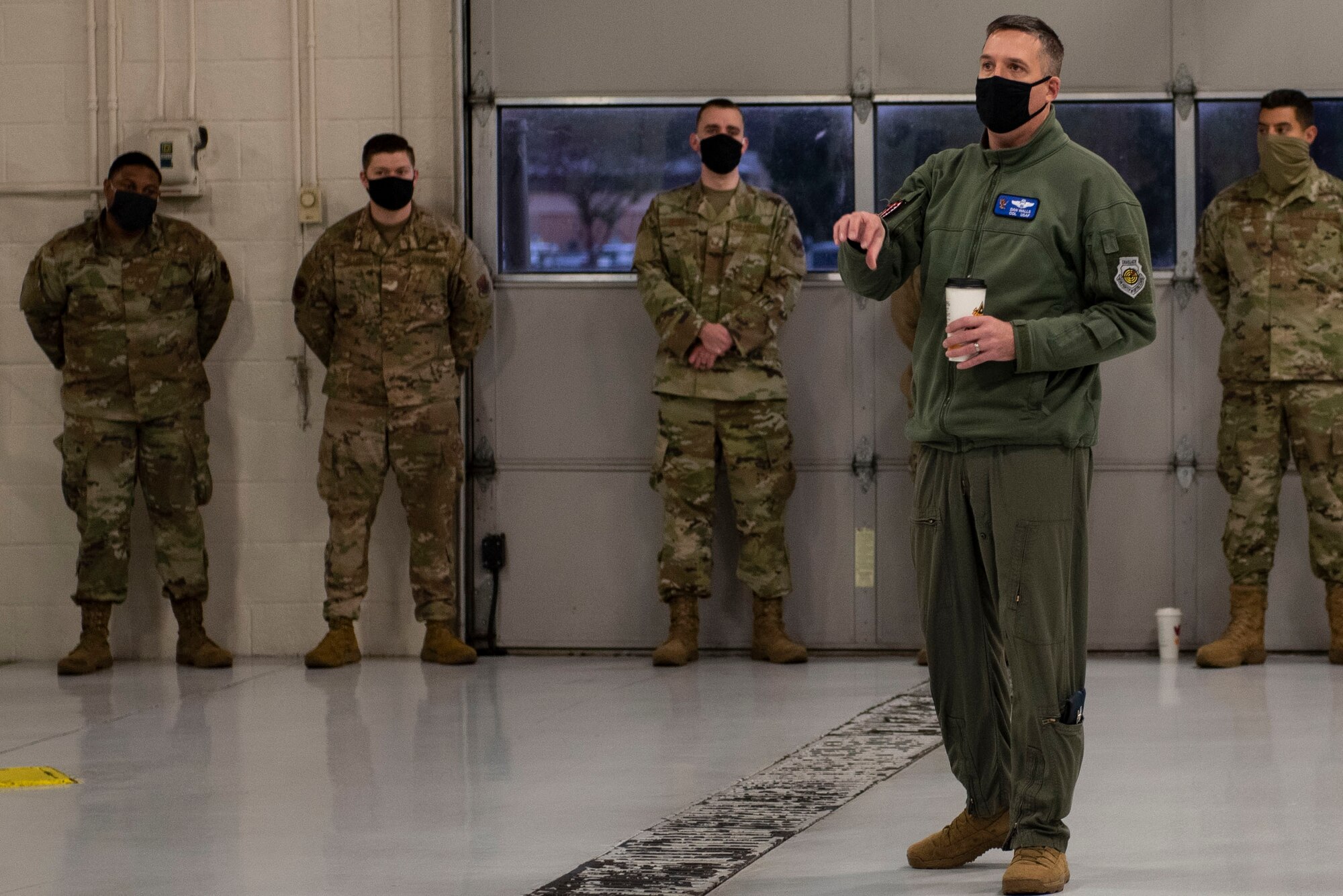 A photo of Col. Dan Walls, 23d Wing commander speaking to Airmen.