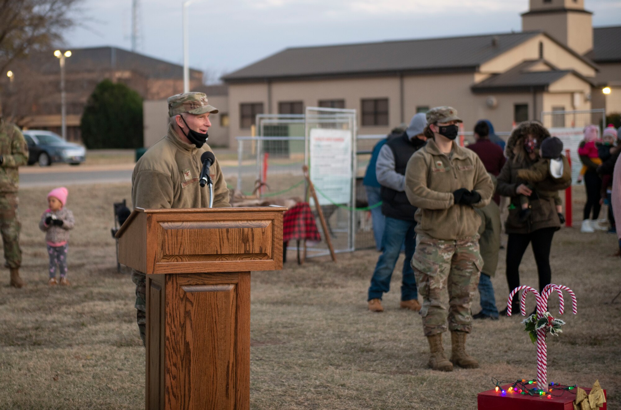 Col. David Vanderburg, 97th Mission Support Group commander, gives a speech during the annual holiday tree lighting event, Dec. 3, 2020, at Altus Air Force Base, Oklahoma. Vanderburg explained there are more than 130 Altus Airmen currently deployed and encouraged attendees to remember them and their loved ones during the holiday season. (U.S. Air Force photo by Airman 1st Class Amanda Lovelace)